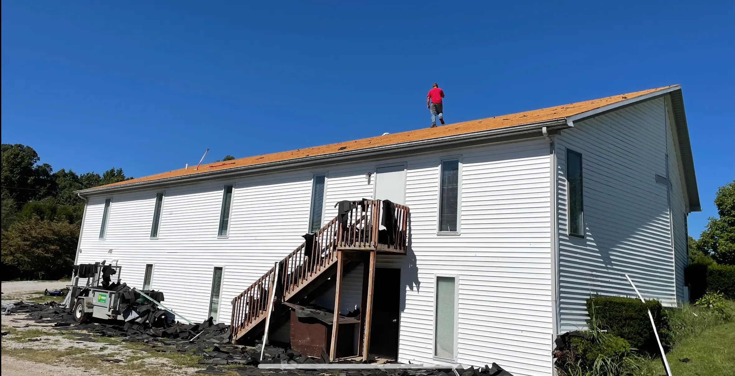 Roof tearoff in progress